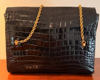 Incredible and rare Cartier handbag ca. 1930’s.  with 18kt gold hardware throughout and one small ruby on clasp.  The gold hardware and ruby have been tested by a renowned local Jeweler