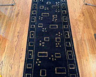 Very nice black and gold tone geometric 31” x 10’ rug