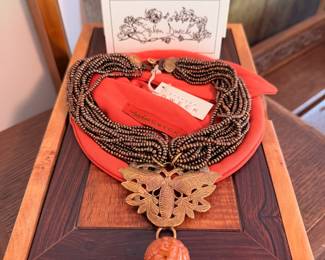 Vintage Stephen Dweck necklace fearing carved jade, brown pearls, Briollet amber drop and a bronze butterfly
