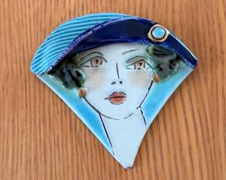 Artist signed pottery brooch