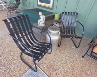 Pair of metal patio chairs, milk can