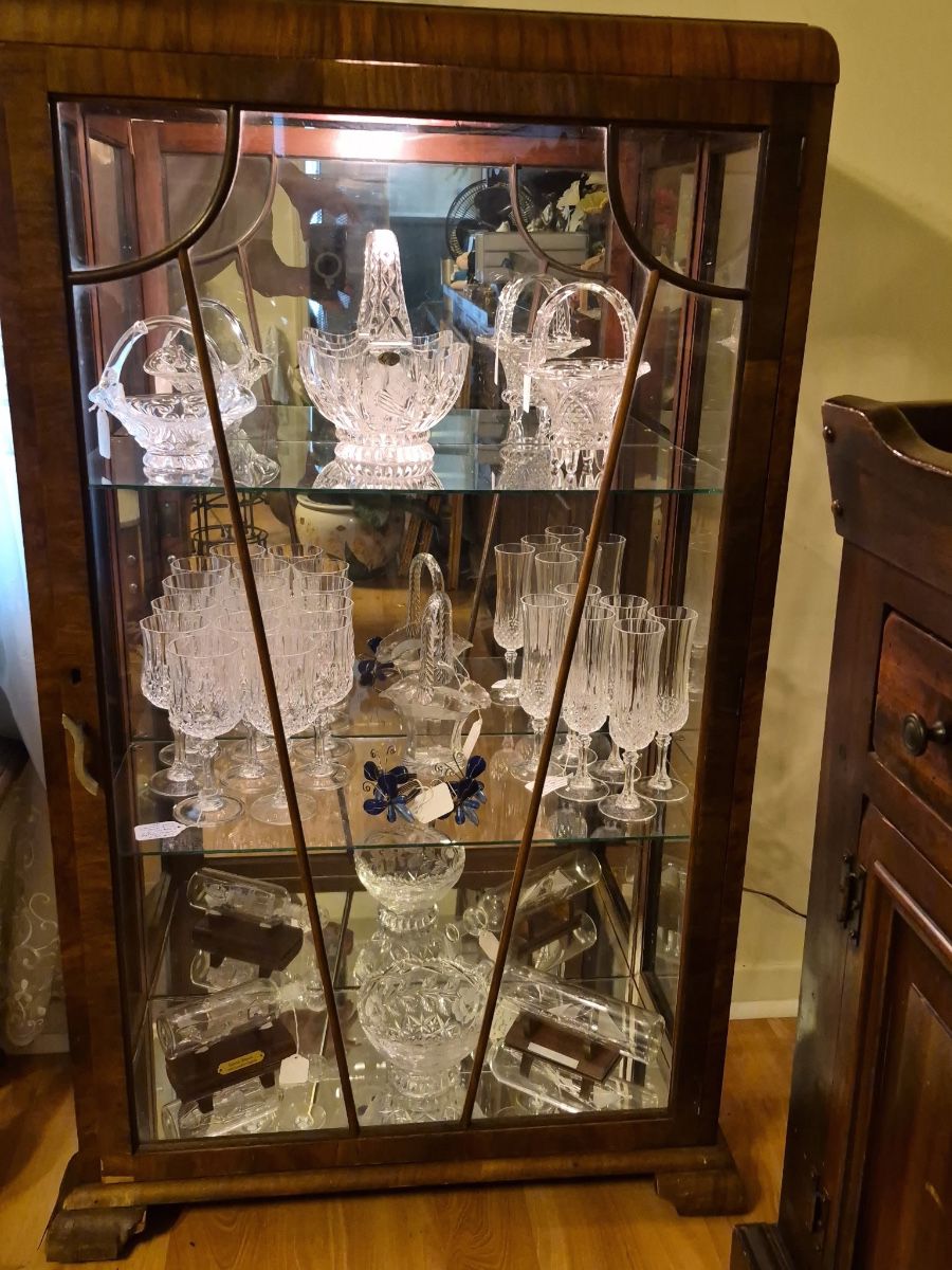 1930βs Art Deco waterfall curio cabinet