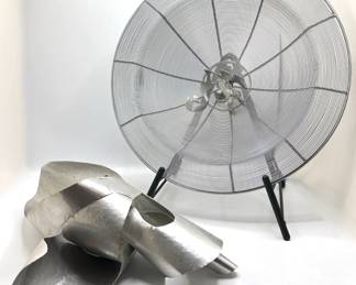 2 Metal Sculptures: Large Disc On Guitar Stand & Bent Aluminum Lot #: 40