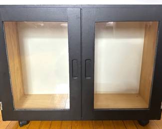 Glass Door Wood Cabinet On Wheels Lot #: 105