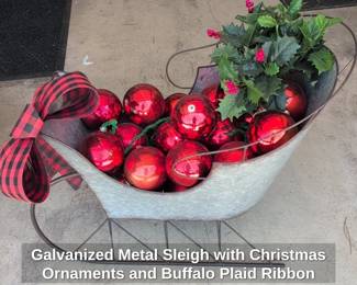 Galvanized Metal Sleigh with Christmas Ornaments and Buffalo Plaid Ribbon