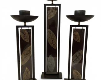 Set of Three Modern Black Metal Pillar Candle Holders with Leaf Motif Inserts