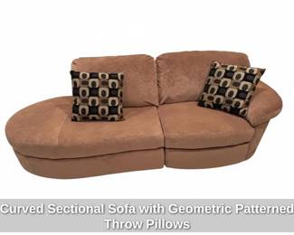 Curved Sectional Sofa with Geometric Patterned Throw Pillows