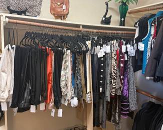 Closet full of name brand clothing, shoes and handbags