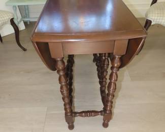 Antique gate leg table and two chairs.