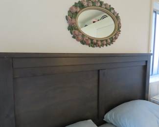 Head board and vintage rose decorated oval mirror.