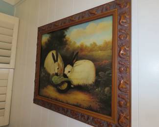 Cute antique rabbits eating lettuce painting.