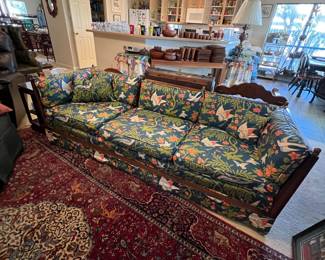 This couch is fantastic… The family had it recovered a few years back. It still looks great… The fabric is vibrant and it’s such a breath of fresh air.