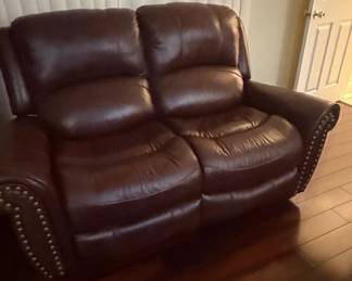 Brown Leather Reclining Loveseat with Nailhead Trim and Tufted Cushions