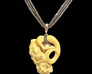 Multi-strand Bead Chain & Carved Bone Pendant with Diamonds with enclosed Pearl