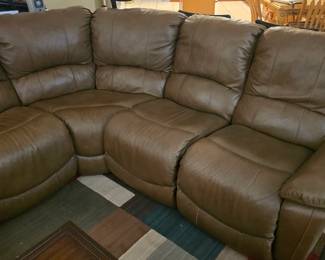 Leather sectional reclining couch 