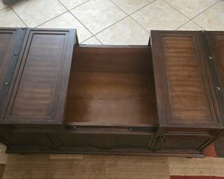Coffee table that opens from the top