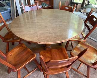 8 solid wood vintage armchairs, perfect for a kitchen or game night; round laminate top table, great for puzzles, projects and games