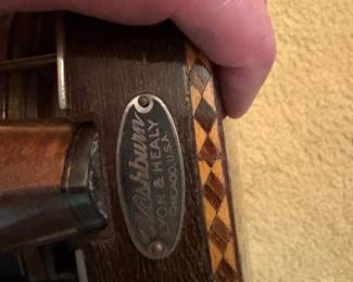 mid 1920s 4 string tenor banjo by Lyon and Healy (Washburn) with an ebony and mother of pearl neck and a mahogany resonator, with original case, overall good condition but the resonator needs a screw
