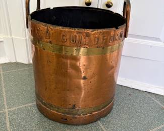 large 19th century copper coal pot, but it would look great next to a fireplace holding wood