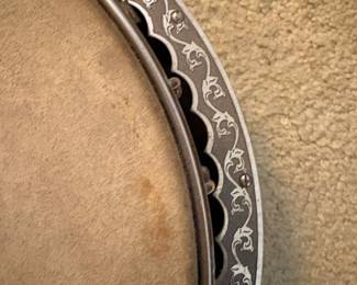 mid 1920s 4 string tenor banjo by Lyon and Healy (Washburn) with an ebony and mother of pearl neck and a mahogany resonator, with original case, overall good condition but the resonator needs a screw