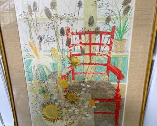 large framed print of a red chair with flowers