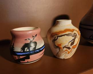 Vintage Nemadji Clay Pottery Vase on the Right. A smaller version of the Navajo Pottery Vase on the Left. 