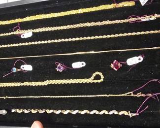 Lots of Gold chains, bracelets, and more