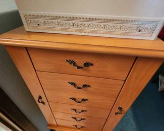 Standing Jewelry Cabinet. On top is a Vintage Jewelry Box.