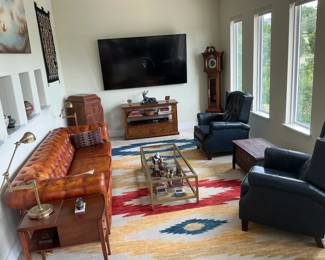 Media Room 2 blue leather recliners and TV media cabinet / display drawer.