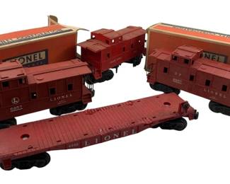 248 - Box Lot of Lionel Train Cars 2"x2"x11" (Description): A box lot of Lionel train cars. The lot includes multiple red cabooses and a flatcar, some with original Lionel boxes. Largest measures approximately 2 inches by 2 inches by 11 inches.