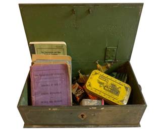 1058 - Metal Box w/ Contents 4"x12"x7" (Description): Vintage metal box with contents. The box measures 4 inches by 12 inches by 7 inches and contains assorted items including railroad documents from The Chesapeake and Ohio Railway Co., vintage tins, and miscellaneous ephemera.