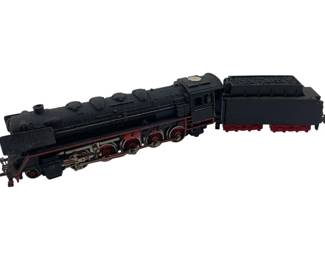 313 - Marklin Locomotive w/ Coal Car 2"x2"x11" (Description): Marklin model locomotive with accompanying coal tender car. This vintage die-cast steam engine features classic black paint with red accent trim and detailed red and gray spoke wheels. The locomotive displays intricate mechanical detailing including piping, valves, and cab windows. The coal car is loaded with simulated coal and matches the black and red color scheme. Measures 2"x2"x11".