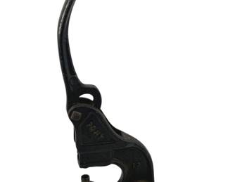 903 - Antique Pony Riveting Tool 7"x6"x2" (Description): Antique Pony riveting tool constructed of cast iron with a black painted finish. This lever-operated press features a curved handle for leverage and a sturdy base designed for bench mounting. The tool is embossed with the Pony brand name on the body. Measures 7 inches by 6 inches by 2 inches.
