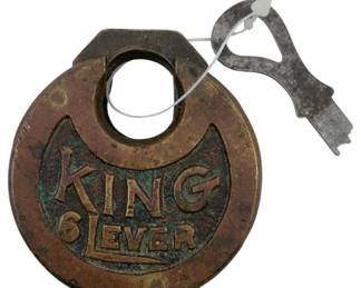 640 - King 6 Lever Padlock w/Key 2.5"x2.25" (Description): Vintage King 6 Lever padlock with original key. The brass padlock features raised lettering on the front. Measures 2 1/2" x 2.25".