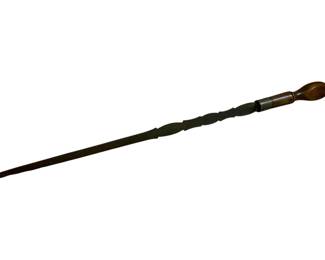 1073 - Antique Tool 34" (Description): Antique tool measuring 34 inches long. Features a turned wooden handle with a bulbous end and a long tapered shaft with decorative turnings along its length.