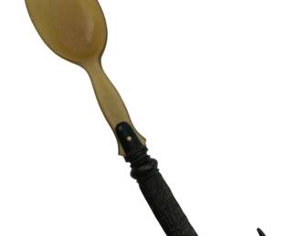 758 - Vintage Hand Carved Horn Spoon 9" (Description): Vintage hand carved horn spoon featuring a distinctive curved handle. Measures 9 inches in length.