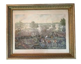 69 - The Battle of Gettysburg Print in Frame (Description): The Battle of Gettysburg print presented in an ornate gilt frame. The hand-colored print depicts the famous Civil War battle scene with cavalry, artillery, and infantry engaged in combat. The frame features decorative carved molding with a green inner border. Measures 25 1/2" x 32".