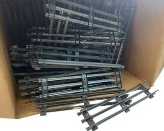 219 - Lot of Train Tracks (Description): A lot of train tracks. These metal train track sections are suitable for model railroad layouts.