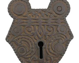 660 - Padlock w/o Key 4"x2.5" (Description): Decorative padlock without key. The lock features ornate embossed scrollwork patterns across its surface. Measures 4 inches by 2.5 inches.