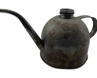237 - Vintage Train Track Oil Can 7"x6"x12" (Description): Vintage train track oil can featuring a rounded body with a long angled spout and curved handle. The can has a screw-top cap for filling. Measures 7 inches by 6 inches by 12 inches.