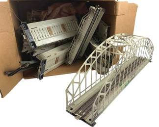 335 - Group of Marklin Train Bridge Display Rails (Description): The lot includes multiple bridge sections with lattice truss framework and integrated rail tracks. Measures 7 inches in length.