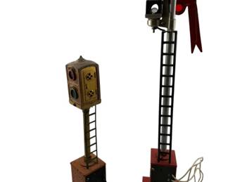 747 - Group Lot of 2 Lionel Railroad Train Signals (Description): Group lot of two Lionel railroad train signals. These vintage model train accessories include different signal styles for layout displays. Measures 15 inches tall. Used as is electric/electronic/mechanical item. No guarantee all components, untested.
