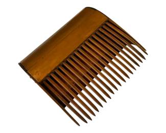 71 - Ant. Wood & Copper Cranberry Scoop Rake (Description): Antique cranberry scoop rake constructed of wood and copper. This traditional harvesting tool features a curved wooden back with copper binding and long wooden tines designed for gathering cranberries from bogs. The rake displays a warm, aged patina consistent with its age and use. Measures 8" x 18" x 19".