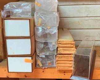 435 - Group Lot of 10 Display Cases for Trains (Description): Group lot of ten display cases designed for trains. Each case measures 7 inches by 25.5 inches by 5.5 inches.