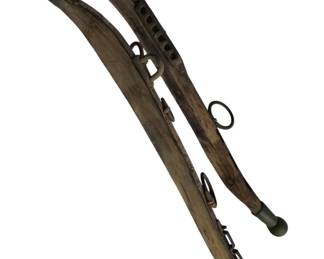 768 - Vintage Wood & Metal Horse Harness Yokes 27" (Description): Vintage wood and metal horse harness yokes featuring curved wooden forms with metal hardware and fittings. These traditional equestrian implements display characteristic construction of period horse tack. Measures 27 inches.