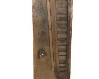 818 - Antique Wood Train Display 67"x12" (Description): Antique wood train display featuring a weathered patina with visible age and character. The piece includes a slatted section and various cutouts and notches suggesting its historical use in railroad or industrial contexts. The elongated wooden panel shows authentic wear consistent with age. Measures 67 inches by 12 inches.