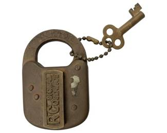 601 - RCo Signal Service Padlock w/Key 3"x2" (Description): RCo Signal Service padlock with key. The lock features the RCo Signal Service marking and comes with its original key attached by a ball chain. Measures 3" x 2".