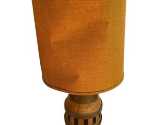 807 - Mid-Century Wheel Hub Lamp 37" (Description): The lamp measures 37 inches in height and includes a burlap drum shade with a wooden finial. Used as is electric/electronic/mechanical item. No guarantee all components, untested.