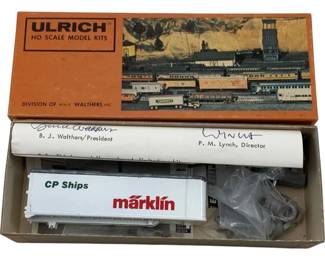1214 - Ulrich HO Scale Marklin Semi-Truck Model Kit (Description): Marklin semi-truck model kit in HO scale, presented in original Ulrich box. The kit features a CP Ships branded white container trailer. Includes instruction sheet signed by B.J. Walthers, President, and P.M. Lynch, Director. Kit components and hardware included. Manufactured by Ulrich, a division of Wm. K. Walthers Inc.