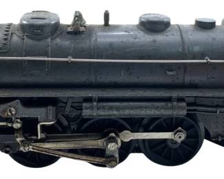 201 - Lionel 027 Engine Train 3"x10"x3" (Description): Lionel 027 engine train in classic black finish. This vintage locomotive features the characteristic styling of Lionel's O27 gauge line. Measures 3 inches high by 10 inches long by 3 inches wide.